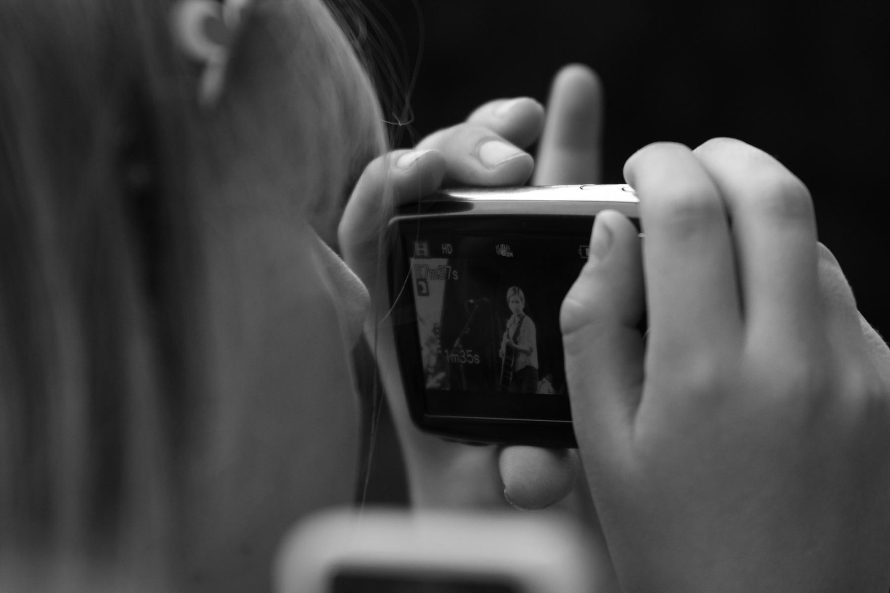 A fan filming Missy Higgins - More FM Summer Vineyard Tour - Feb 2013